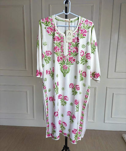 Mehram Lucknowi Chikankari white rayon kurti with shaded pink and green floral embroidery, front view full length on hanger — Noor-e-Awadh